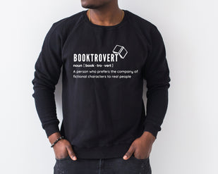 a man wearing a black sweatshirt with the words booktrover printed on it